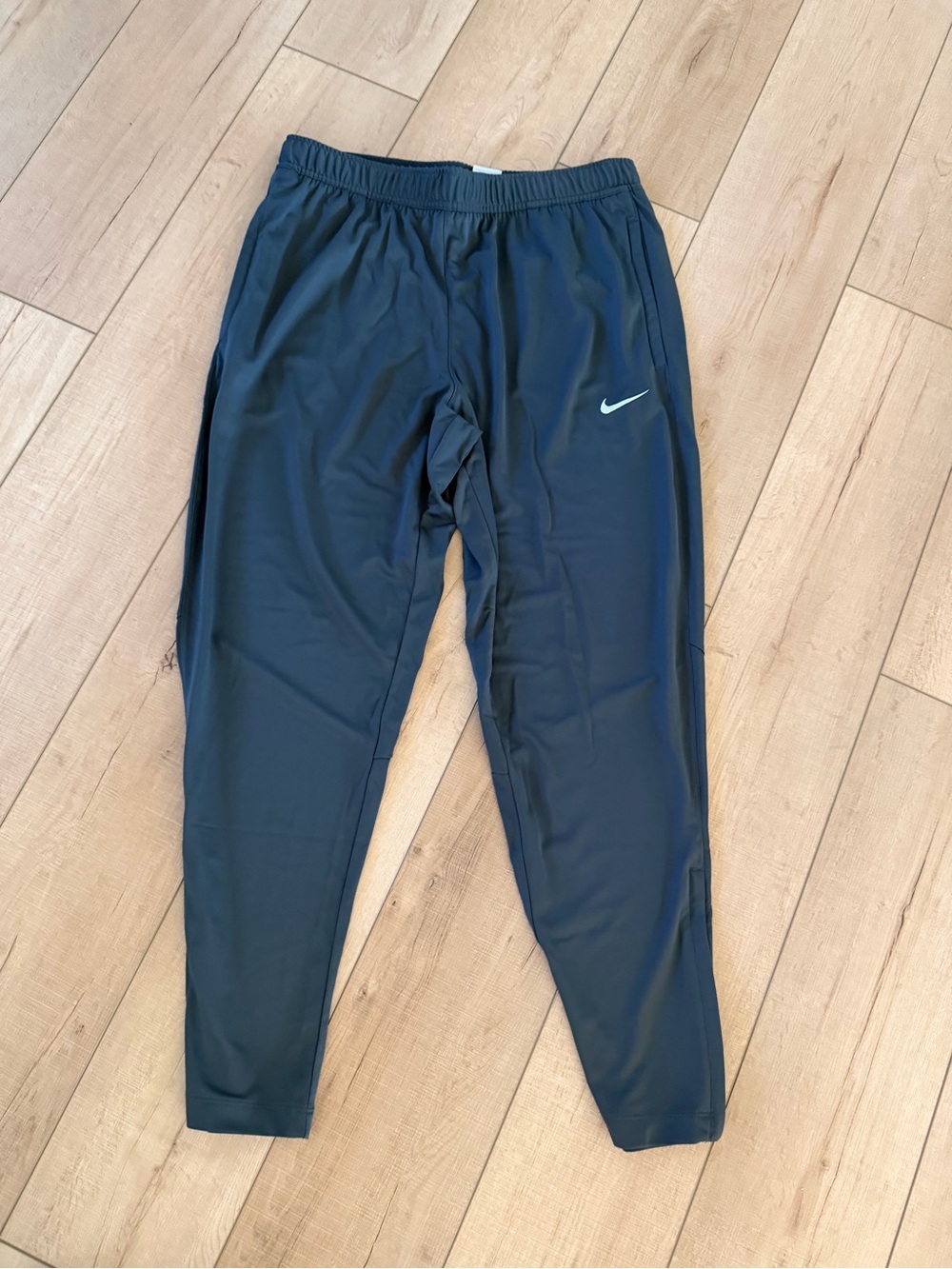 Nike Men’s Gray Performance Joggers with White Swoosh
